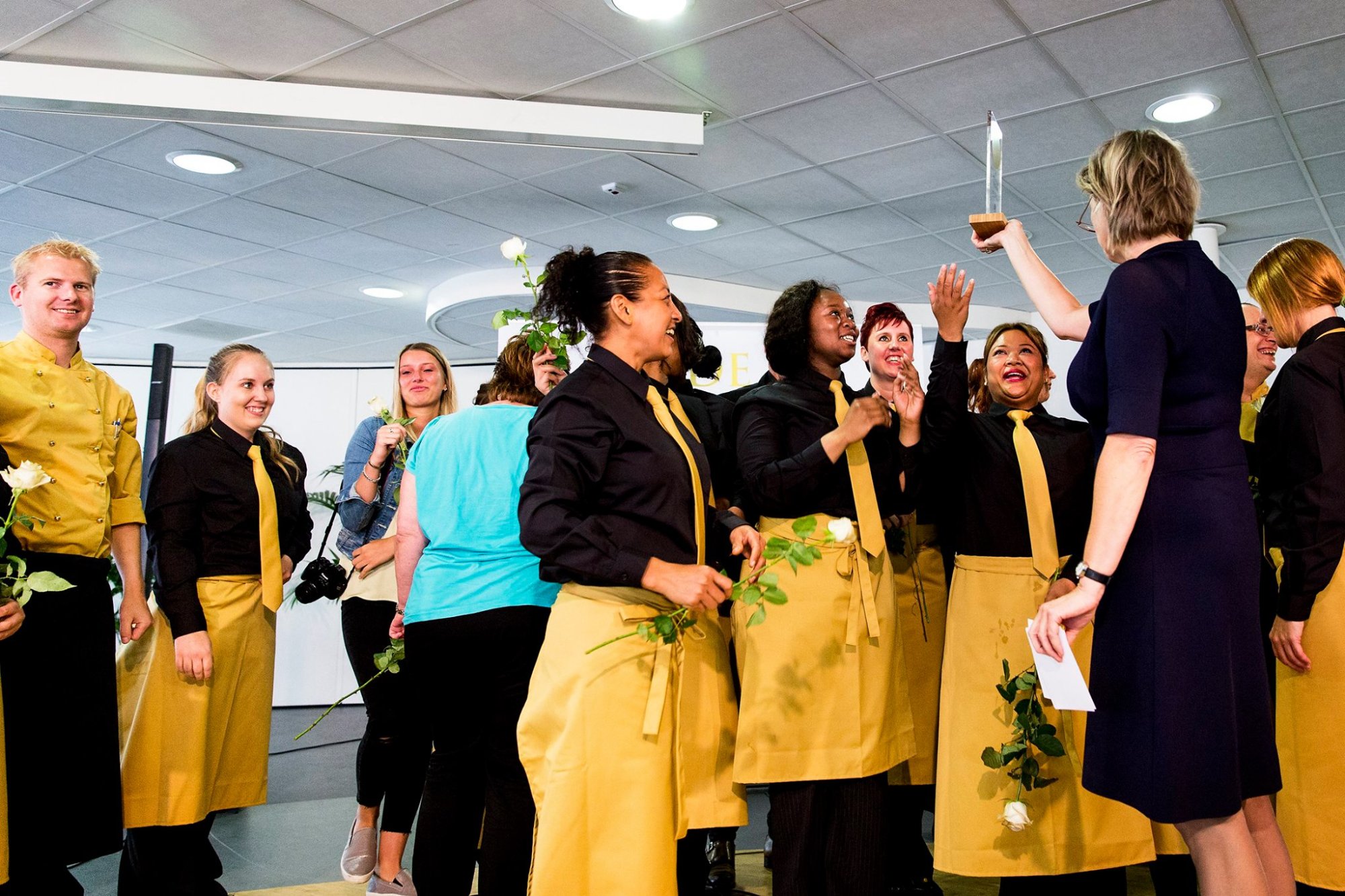 Het team van een winnende zorginstelling tijdens de Gouden Bordjes uitreiking
