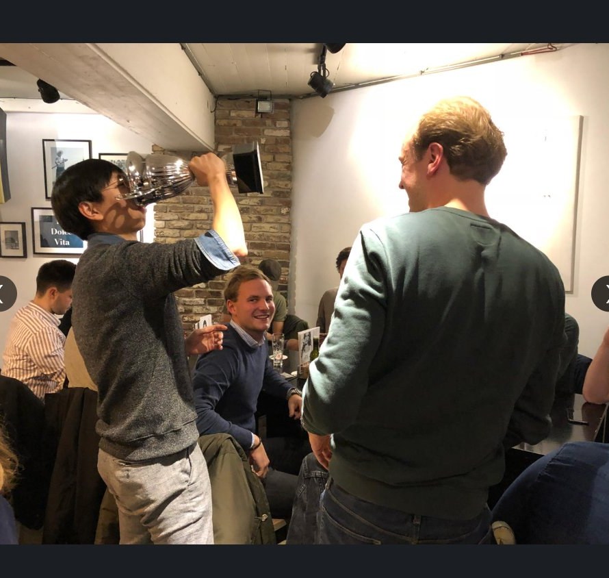 Students celebrating the trophy win